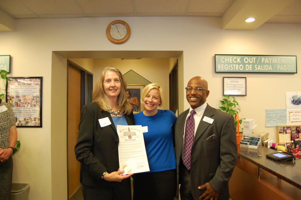 Sharon Adams, Executive Director of ClinicNET, Katherine Blair of Governor Hickenlooper's office and Kraig Burleson of Inner City Health kick off Safety Net Clinic Week 2014.